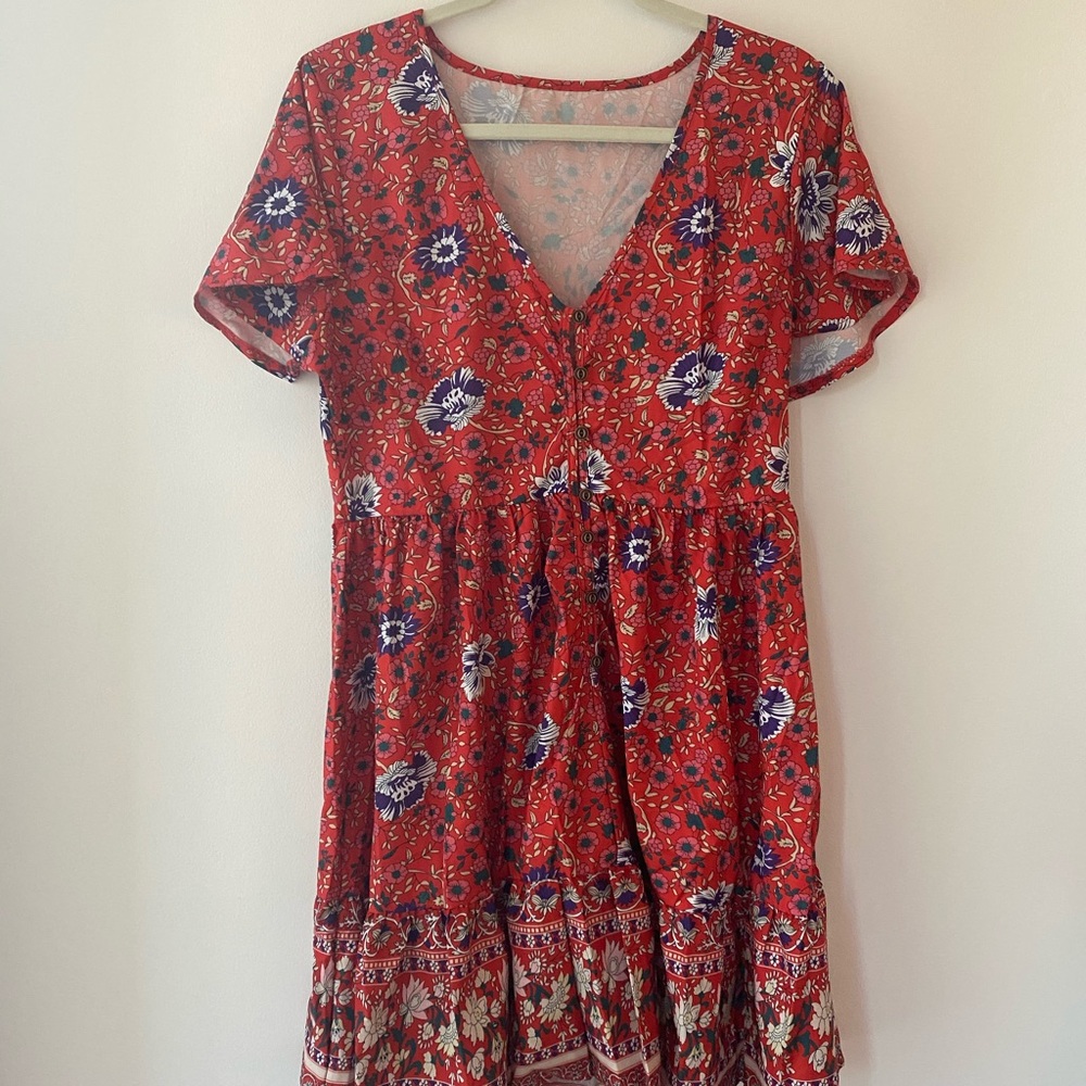 Red Romper With Floral Design